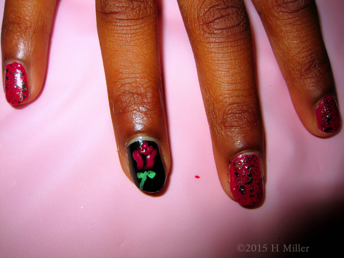 Red Polish With Silver Glitter And A Red Rose Graphic. Kids Nail Art 