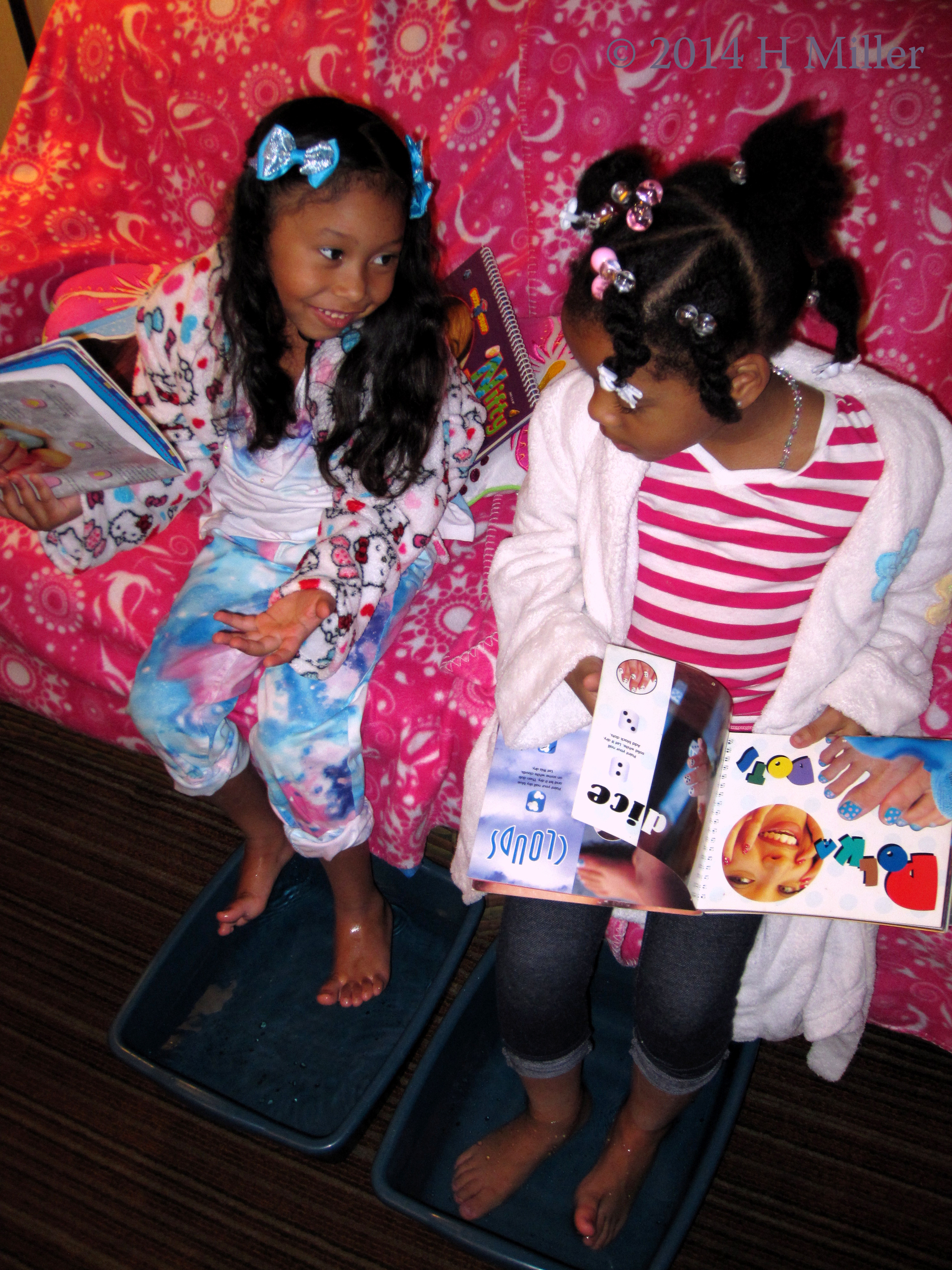 Pedicure Soak In Herbal Scented Water While Looking Thru Nail Art Books Pedicure Soak In Herbal Scented Water While Looking Thru Nail Art Books