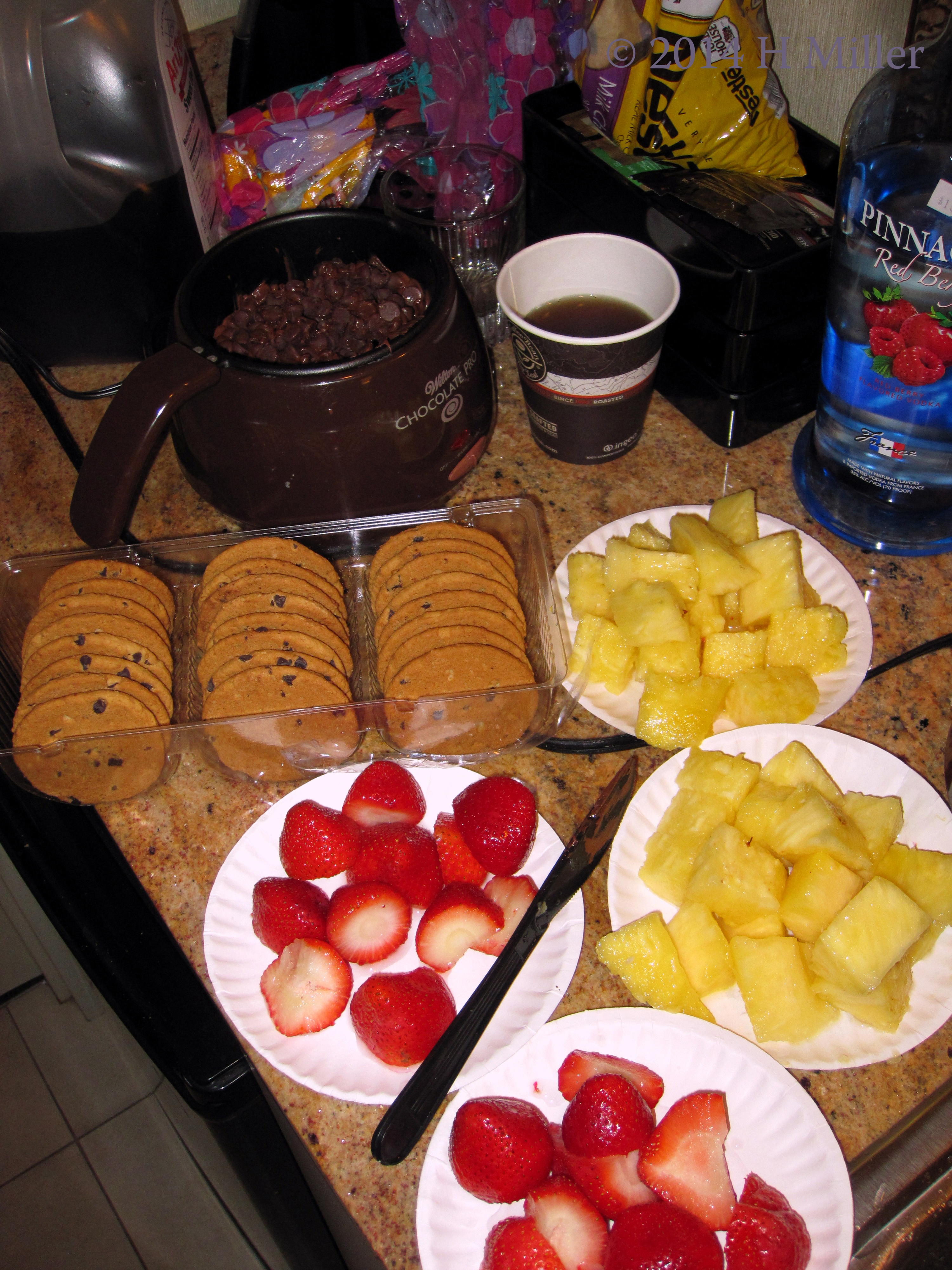 The Chocolate Is Melting, And The Strawberries, Pineapples ,And Cookies Are Ready To Eat! The Chocolate Is Melting, And The Strawberries, Pineapples ,And Cookies Are Ready To Eat!