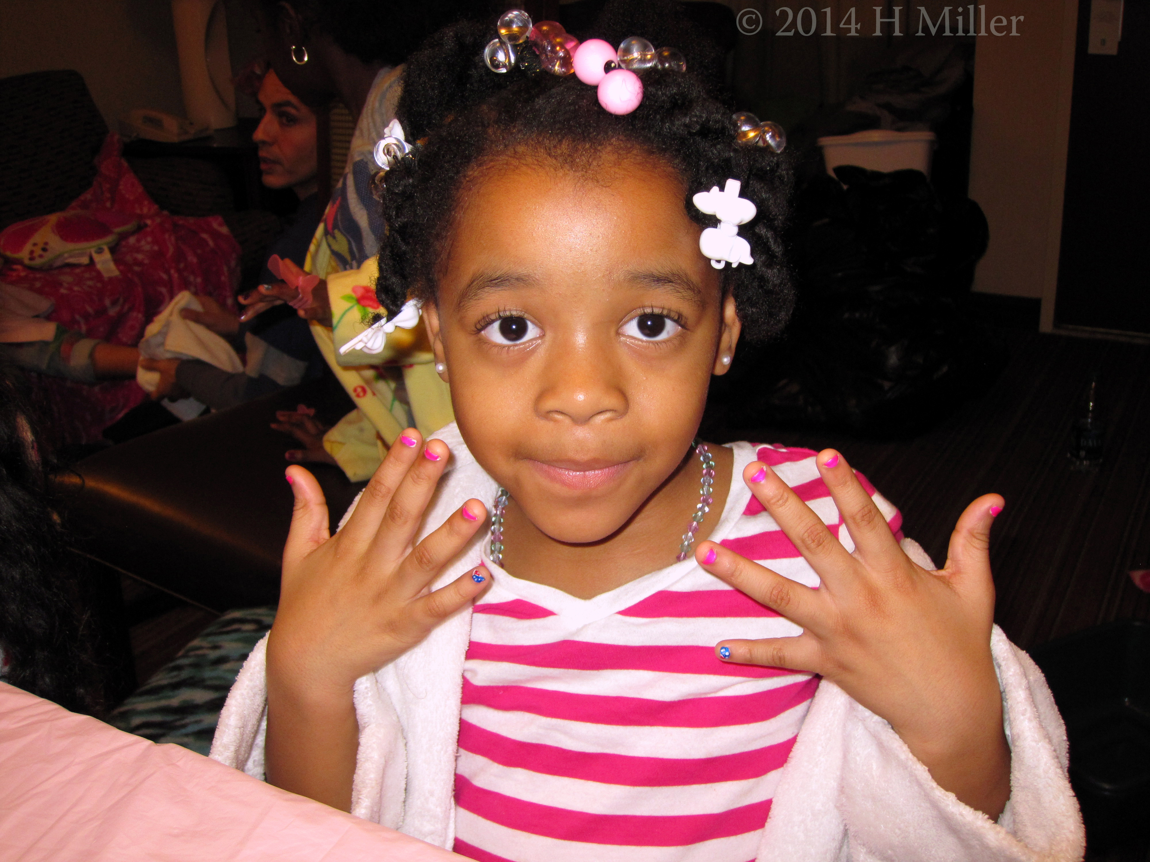 Showing Her Freshly Painted Nail Art