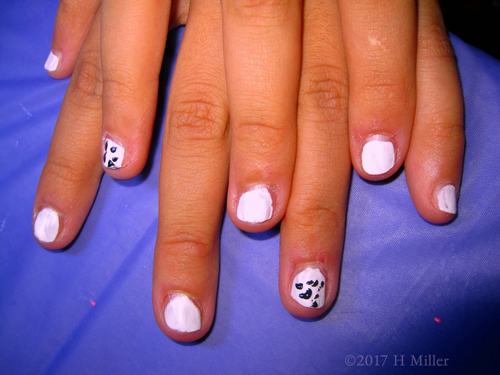 Cow Spots For This Girls Nail Design On Her Mini Mani