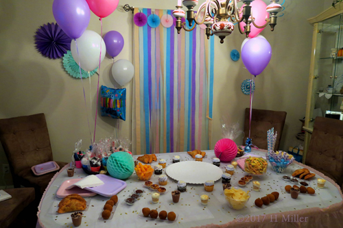 The Cake And Treats Table Looks Super Yummy!