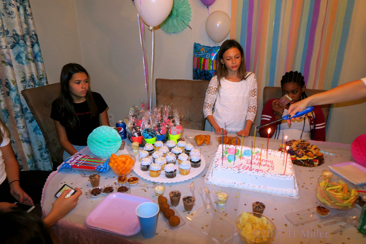 Lighting The Candles On Allison's Spa Birthday Cake! 