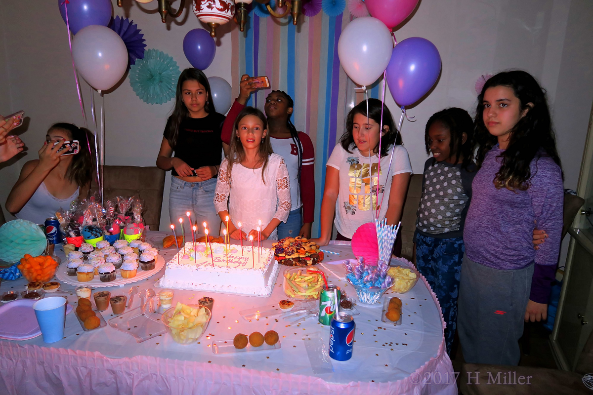 Smiling Behind The Girls Spa Birthday Cake! 