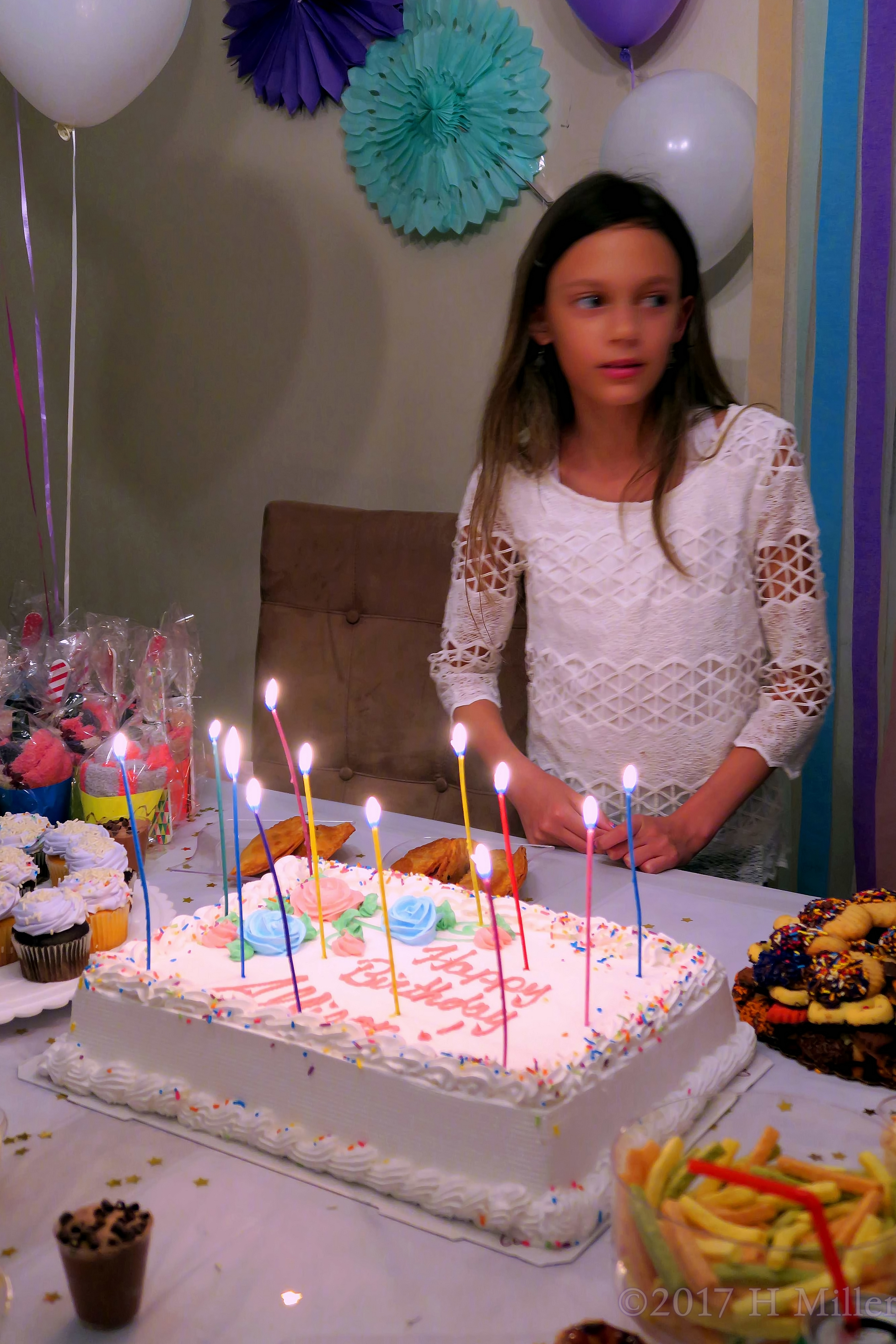 The Birthday Girl Waits Patiently For Cake. 