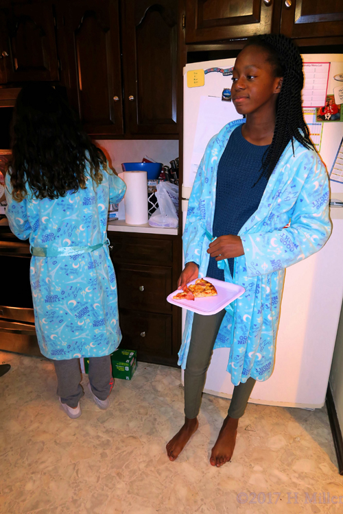 Enjoying Pizza And Snacks. Enjoying Pizza And Snacks.