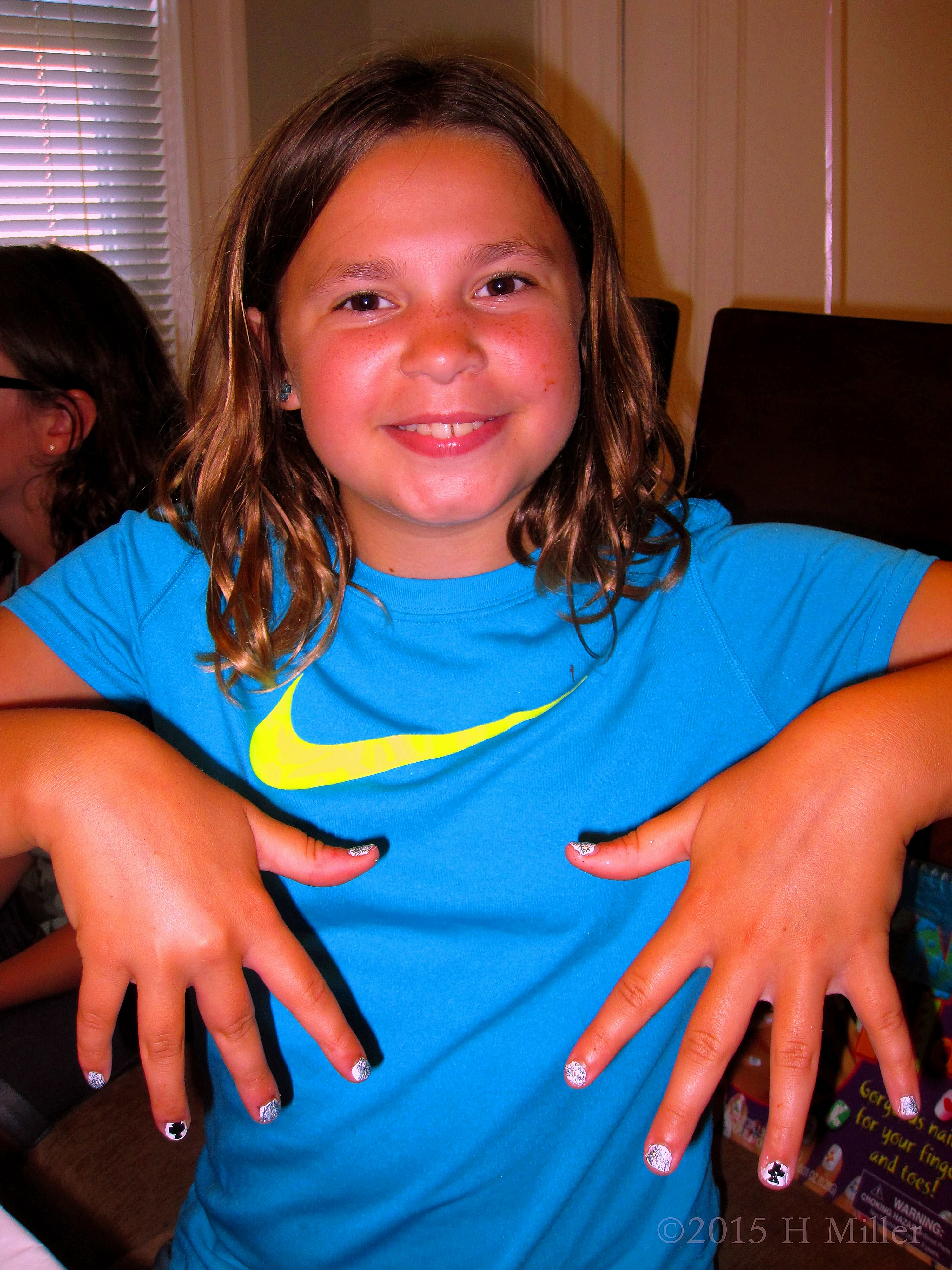 Showing Her Cool White N Silver Nail Polish With Deck Of Cards Spade Graphics. Showing Her Cool White N Silver Nail Polish With Deck Of Cards Spade Graphics.