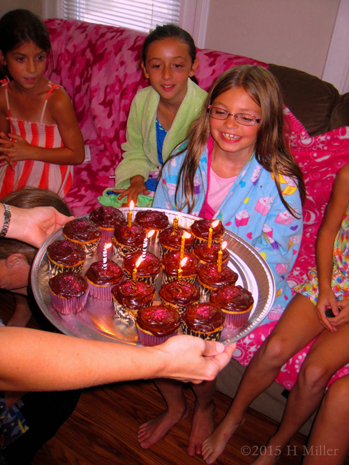 The Birthday Girl And Chocolate Frosting Covered Supckaes With Flaming Candles!!