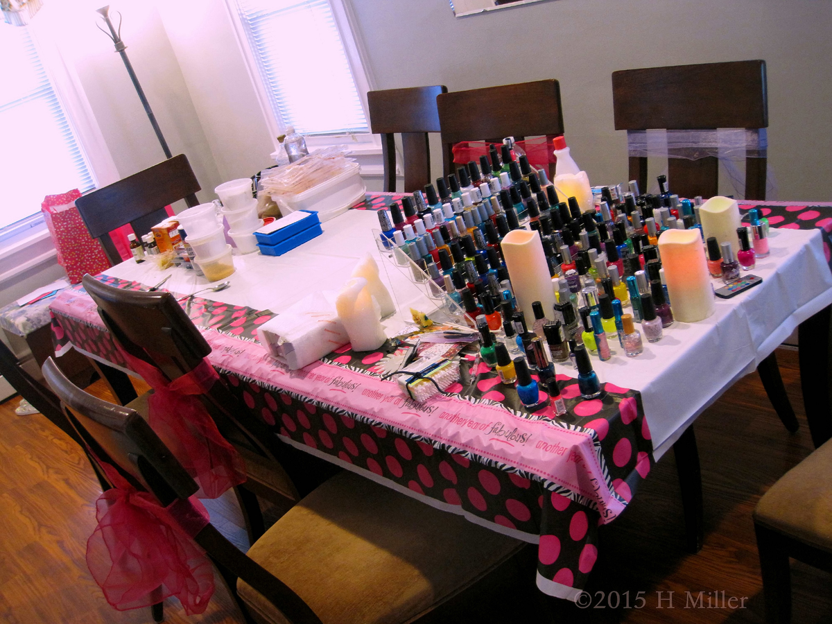 Nail Polish At One Side Of The Table, , Craft Stuff At The Other End. 