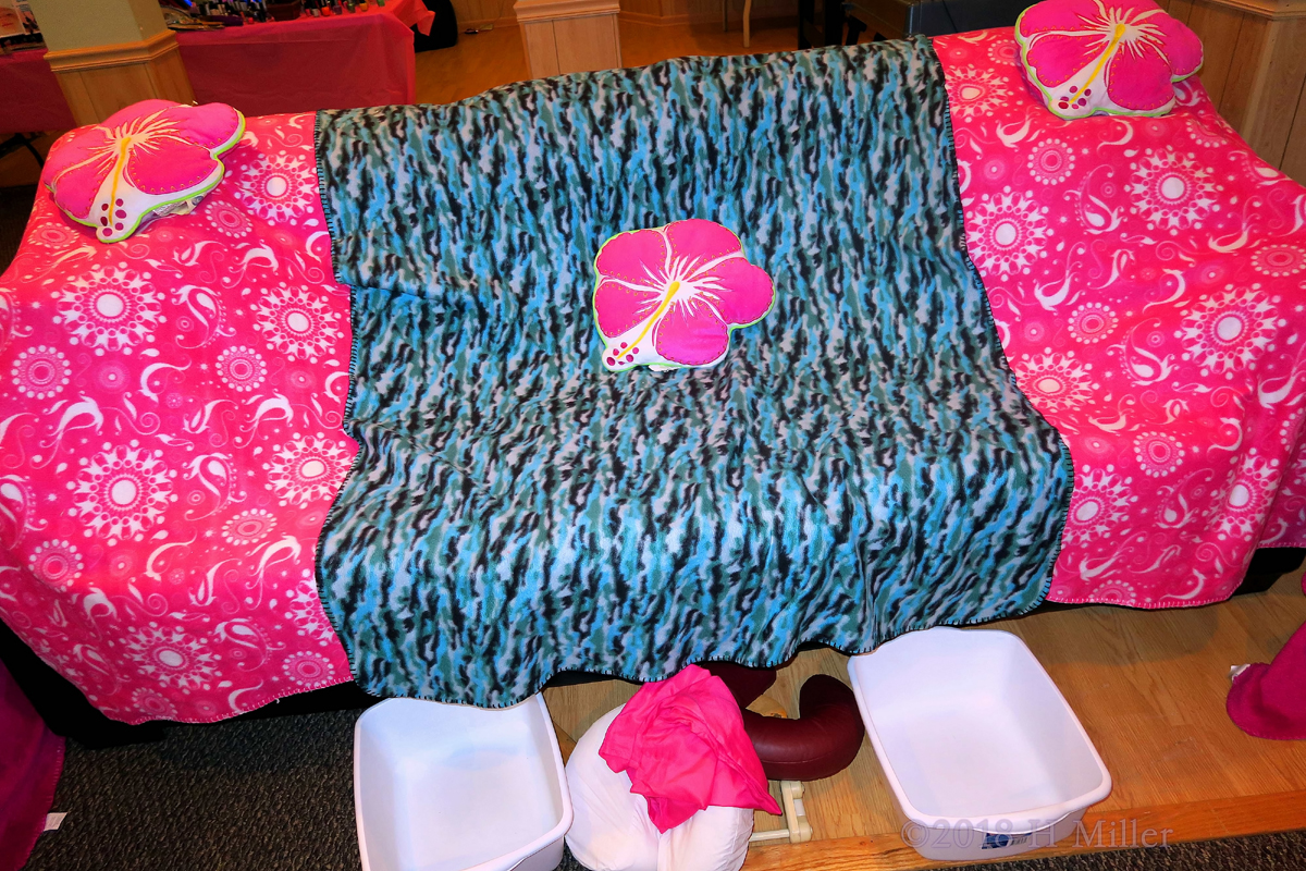 Couch Covered With Comfy Spa Throws With Foot Baths For Kids Pedicures! 