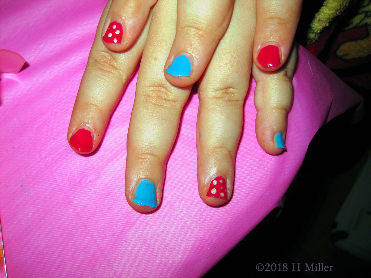 Showing Her Neatly Done Colorful Kids Nail Art! 
