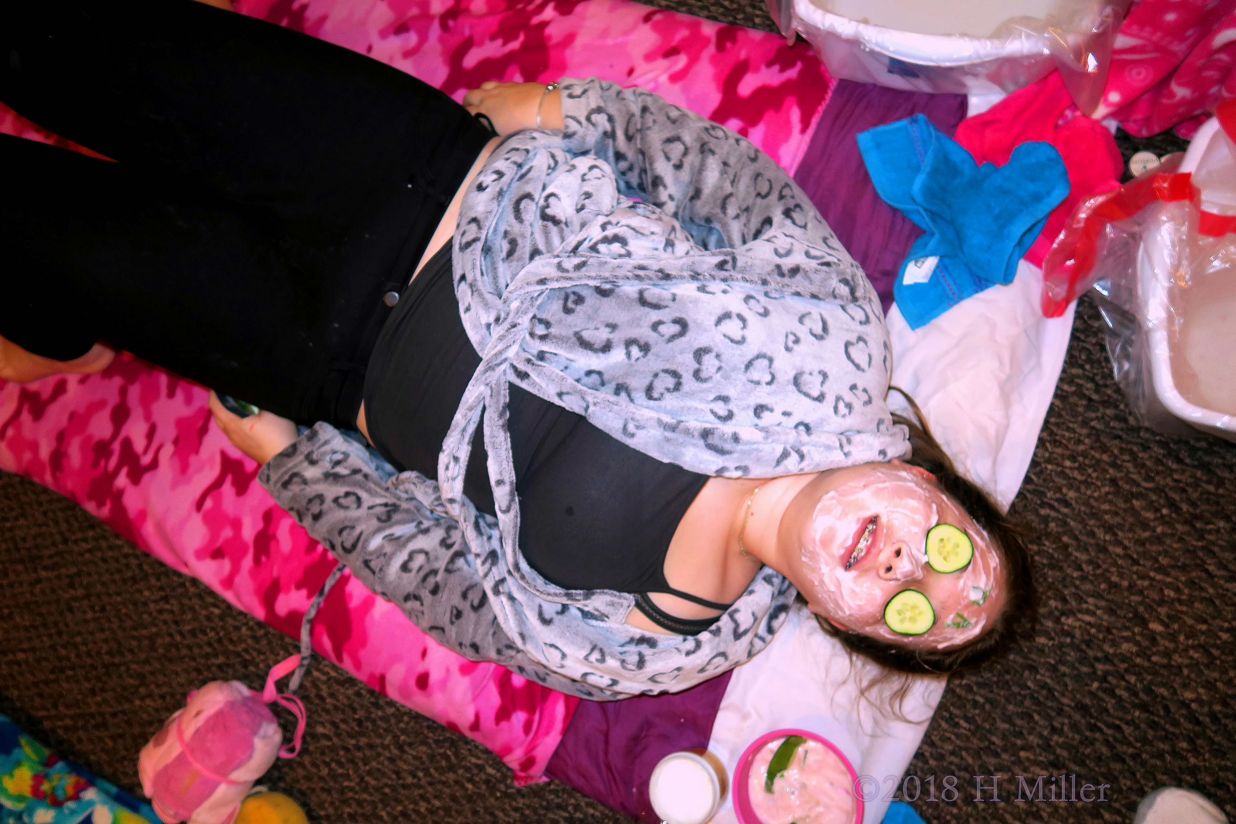 Relaxing And Feeling Soothed During Her Kids Facial. Relaxing And Feeling Soothed During Her Kids Facial.