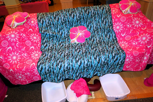 Couch Covered With Comfy Spa Throws With Foot Baths For Kids Pedicures!