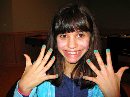 Smiling Big After Her Perfect Kids Manicure