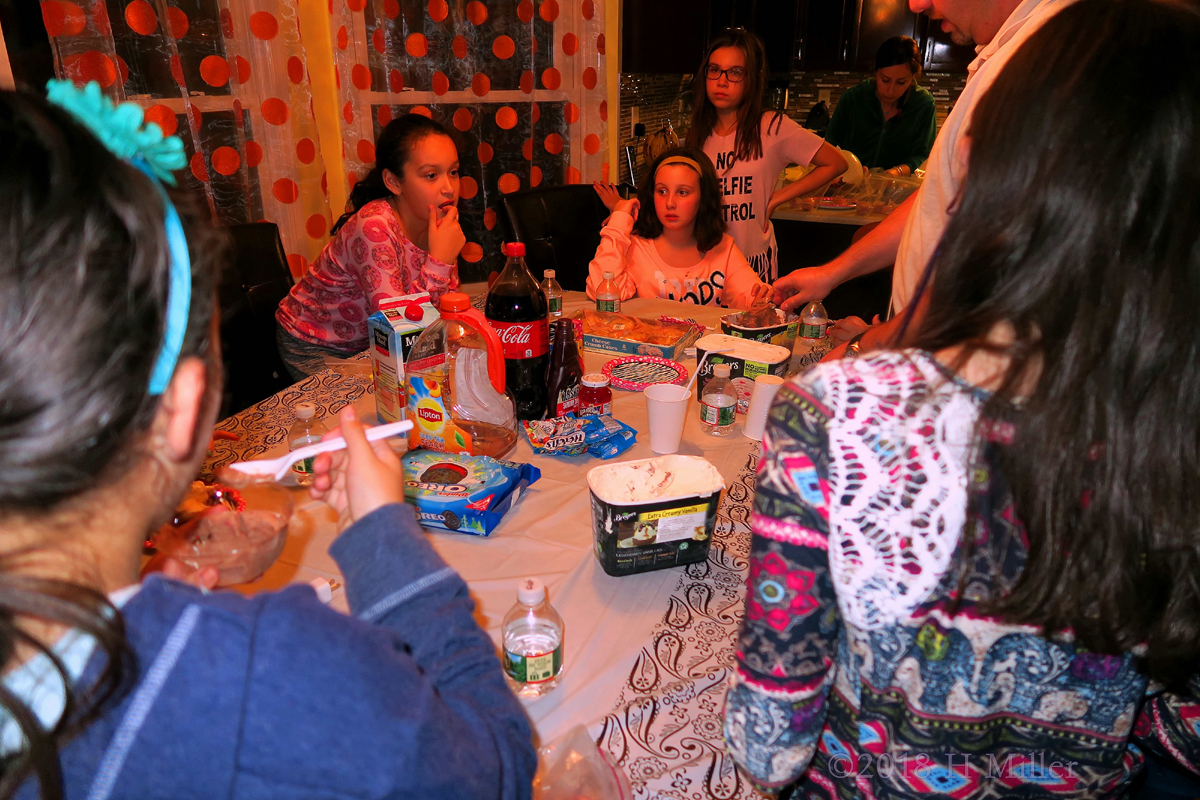 They Enjoy Chitchatting Along With Tasty Dessert At The Girls Birthday Party! 