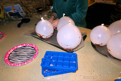 Balloons Being Used For Making Concave Shaped Chocolate Bars!