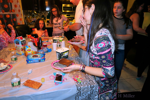 The Girls Having A Fun Time Having Delicious Food And Sweets!