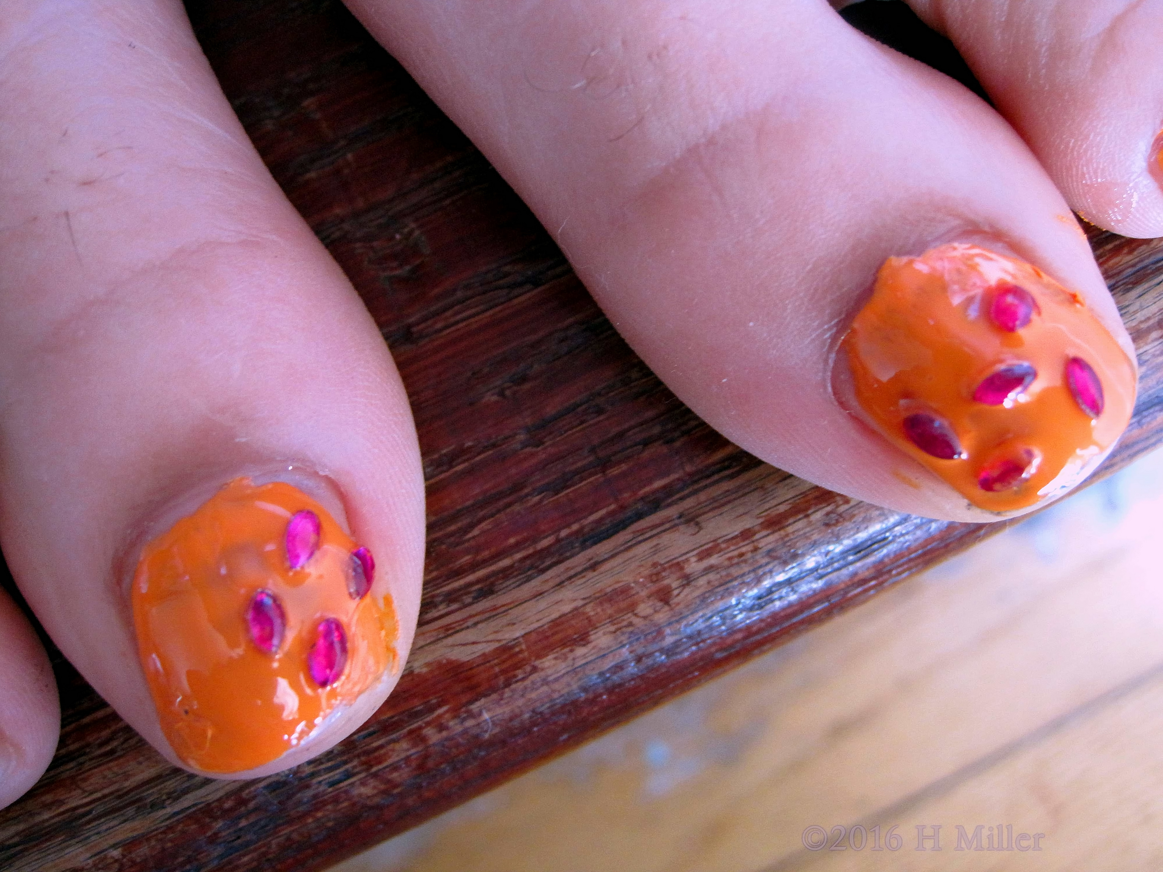 Adorable Pink Jewels On Her Nails For The Kids Manicure. Adorable Pink Jewels On Her Nails For The Kids Manicure.