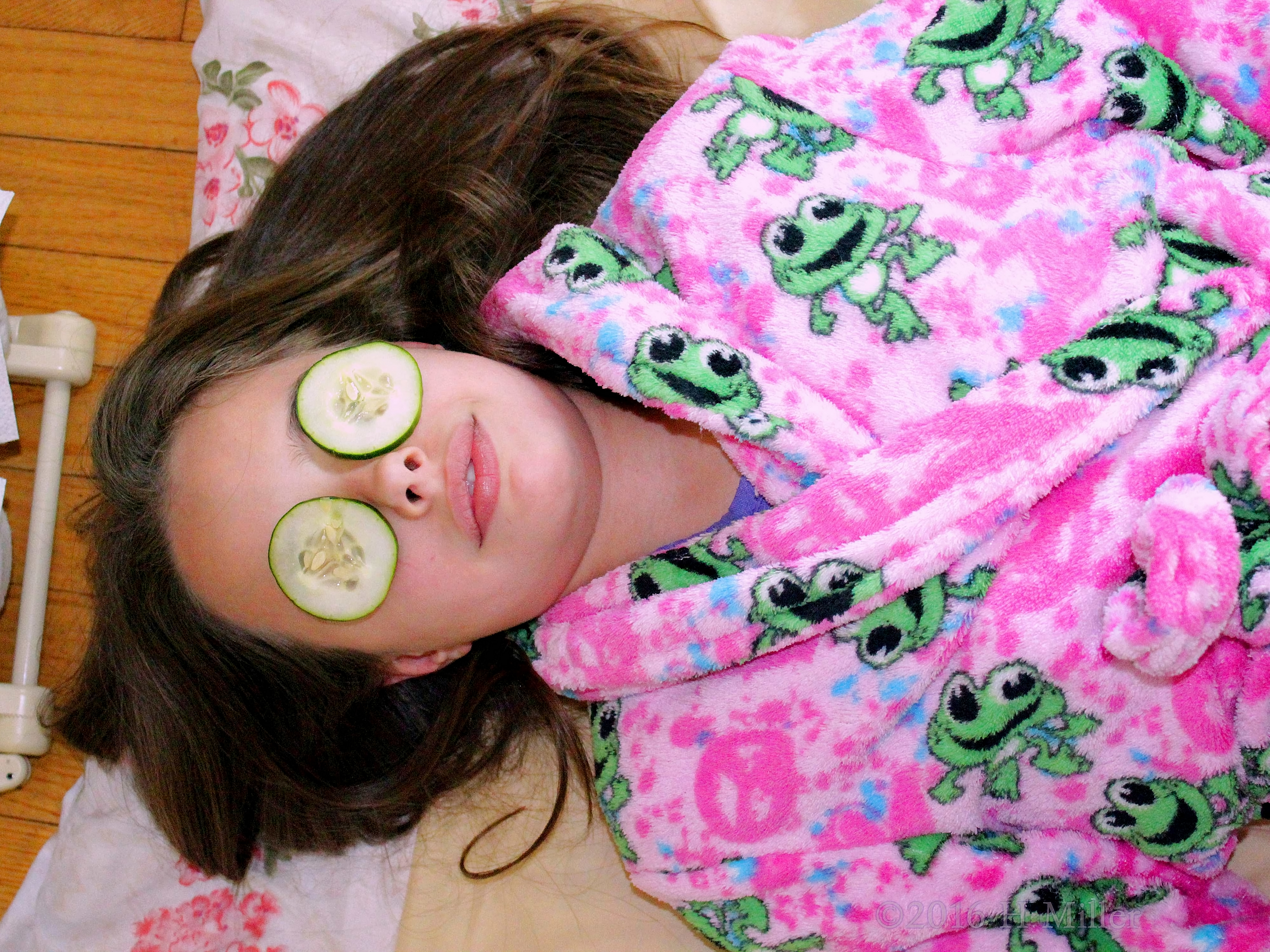 Cucumbers To Refresh Her Eyes During The Kids Facial!