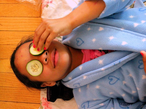 Putting On Cucumbers Before Home Kids Spa Facials Putting On Cucumbers Before Home Kids Spa Facials