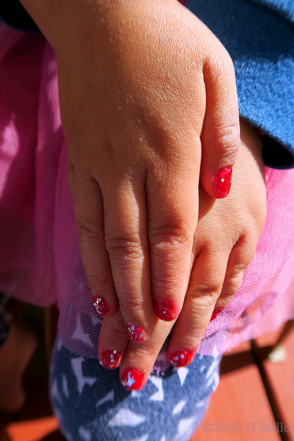 Pretty Red Nail Coat With Silver Sparkles For This Kids Manicure 