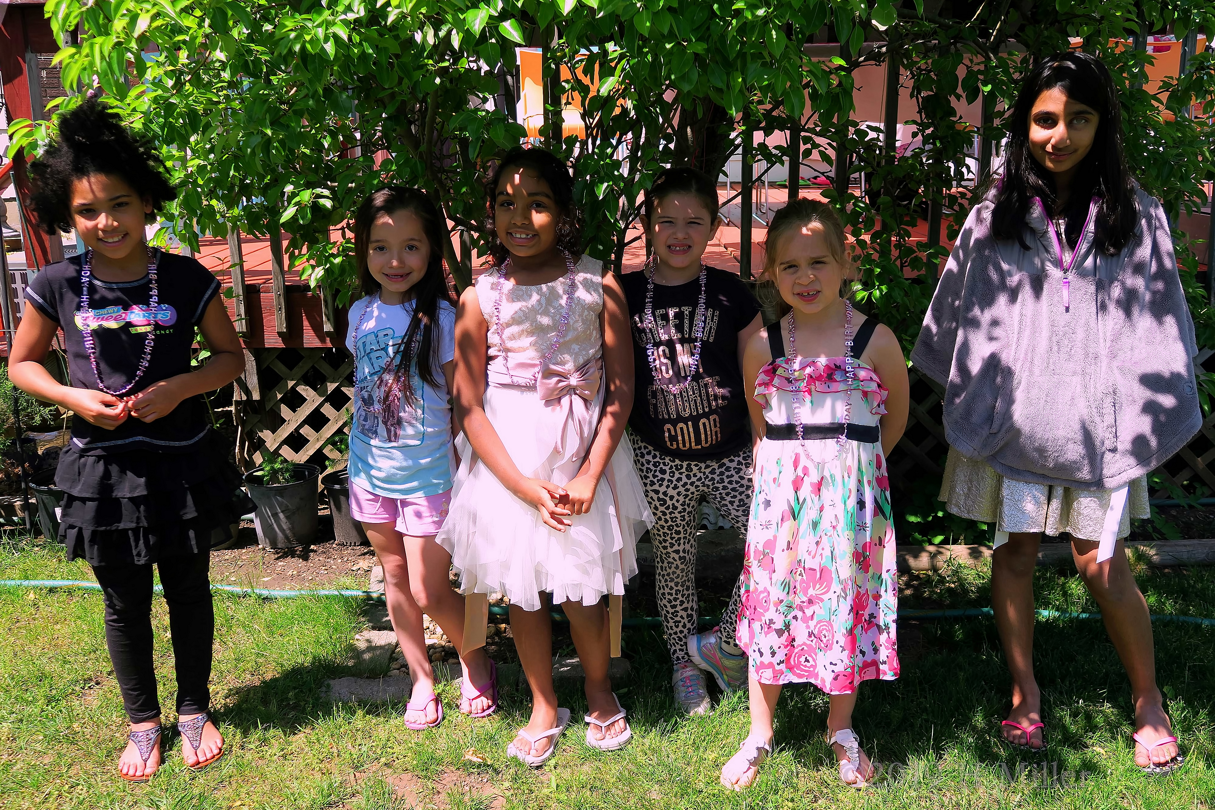 Amiya Posing With Her Guests Infront Of Scenic View Amiya Posing With Her Guests Infront Of Scenic View