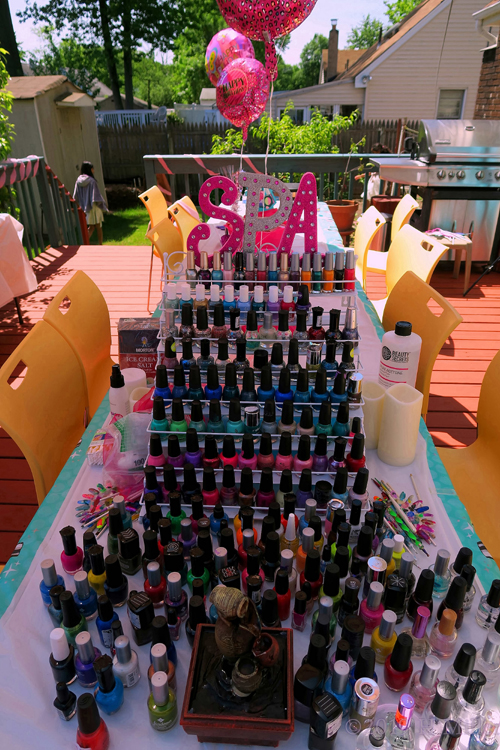 Nail Art Design Station Complete With An Aray Of Nail Polishe