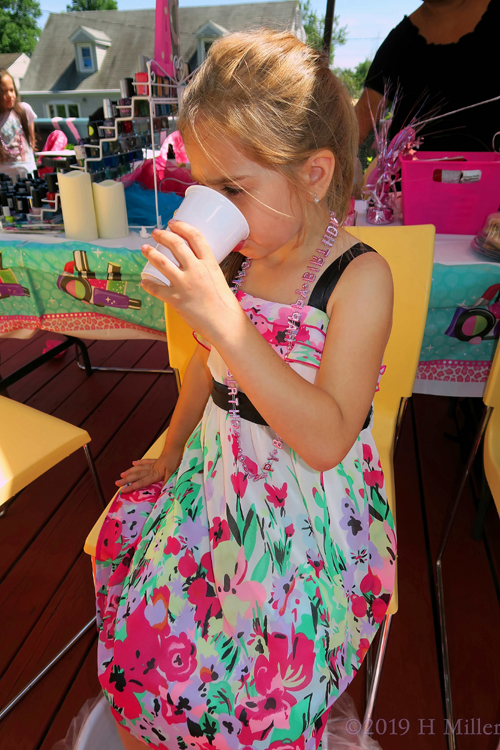Party Guest Enjoying A Cool Drink While Getting Her Mini Pedi! Party Guest Enjoying A Cool Drink While Getting Her Mini Pedi!