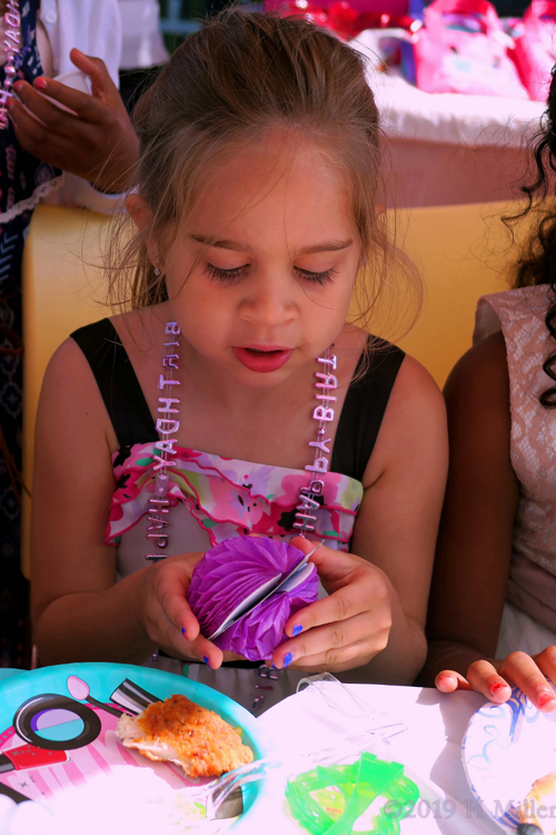Party Guest Playing With Her Craft Toy Party Guest Playing With Her Craft Toy