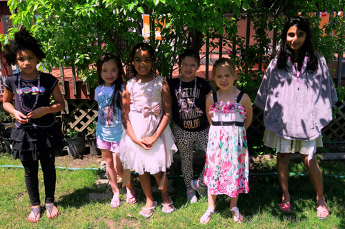 The Birthday Girl And Guests PoseFor The Cameras The Birthday Girl And Guests PoseFor The Cameras