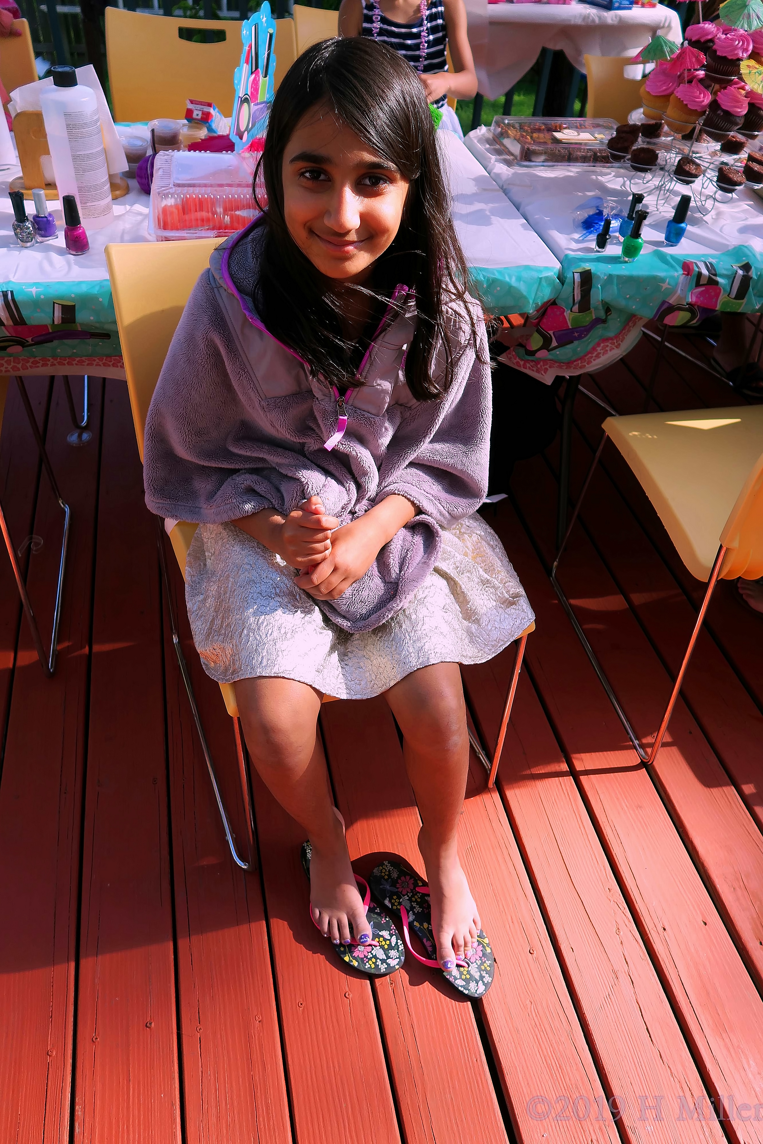 Party Guest Enjoying Her Relaxing Mini Pedi In Her Cool Spa Robe Party Guest Enjoying Her Relaxing Mini Pedi In Her Cool Spa Robe