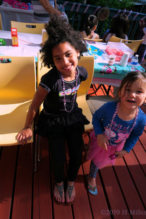 Couple Of Kids Party Guests Having A Blast Couple Of Kids Party Guests Having A Blast