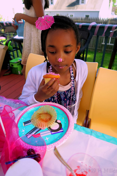 Even This Party Guest Enjoys The Delicious Cupcake Even This Party Guest Enjoys The Delicious Cupcake