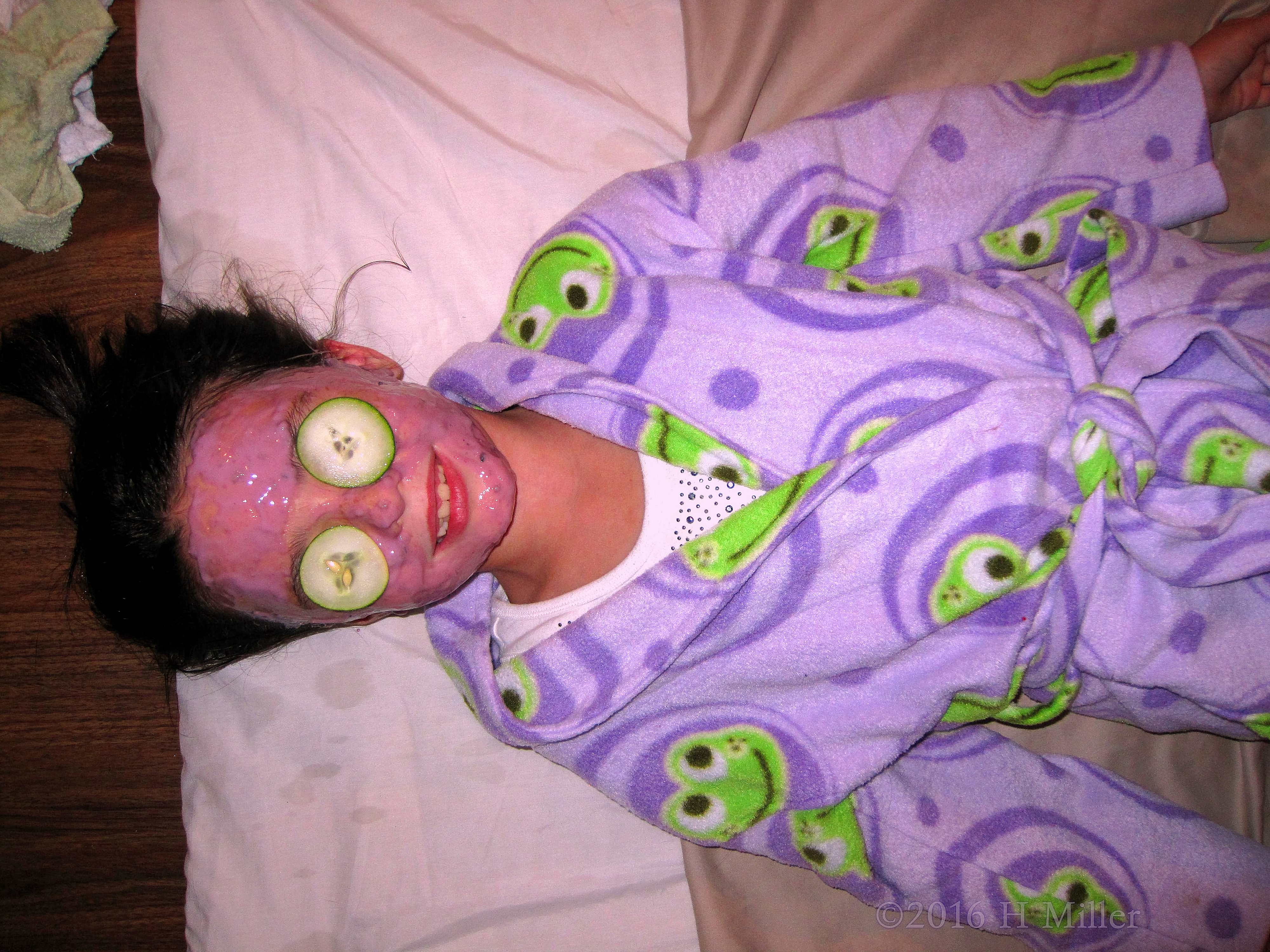 Smiling Through Her Blueberry Face Mask Smiling Through Her Blueberry Face Mask