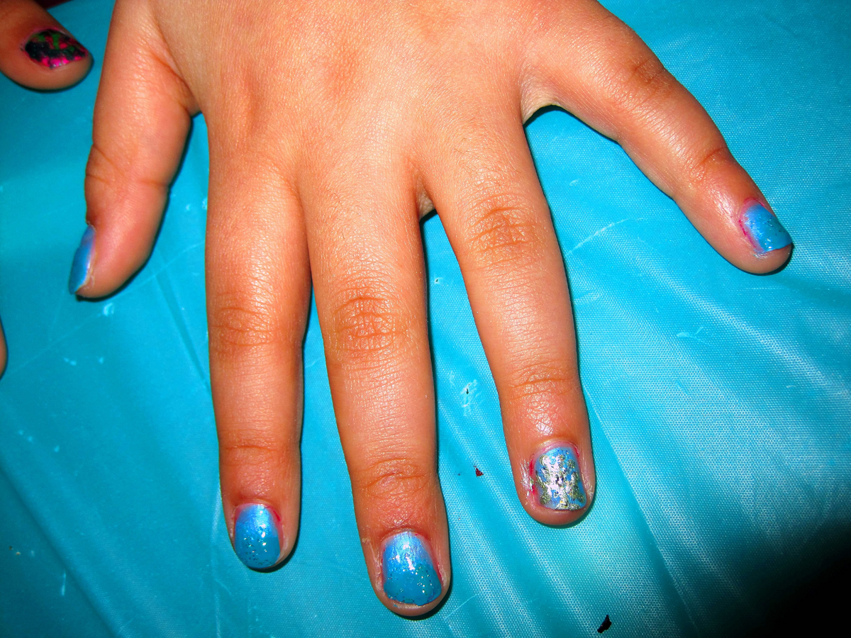 Pretty Blue Manicure With Snowflake Nail Design At The Kids Nail Spa! 