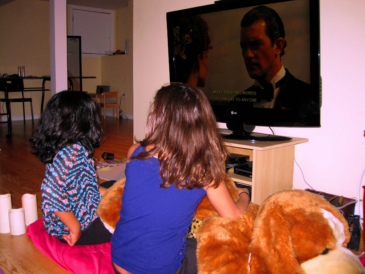 Watching A Movie During The Home Kids Spa Party 