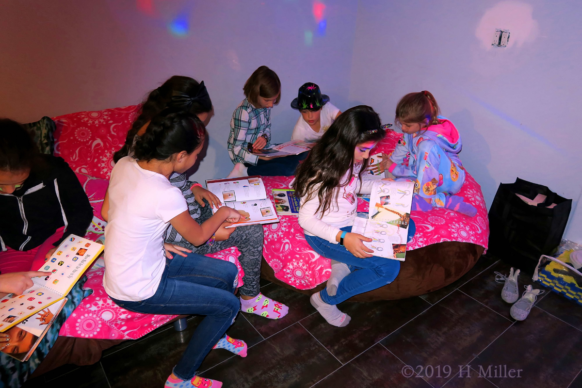 Choosing Crafts! Party Guests Flip Through Nail Art Books At The Spa Party! 
