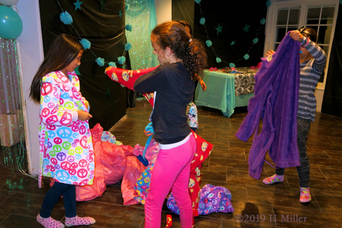 Decorations And Decisions! Party Guests Pick Kids Spa Robes!