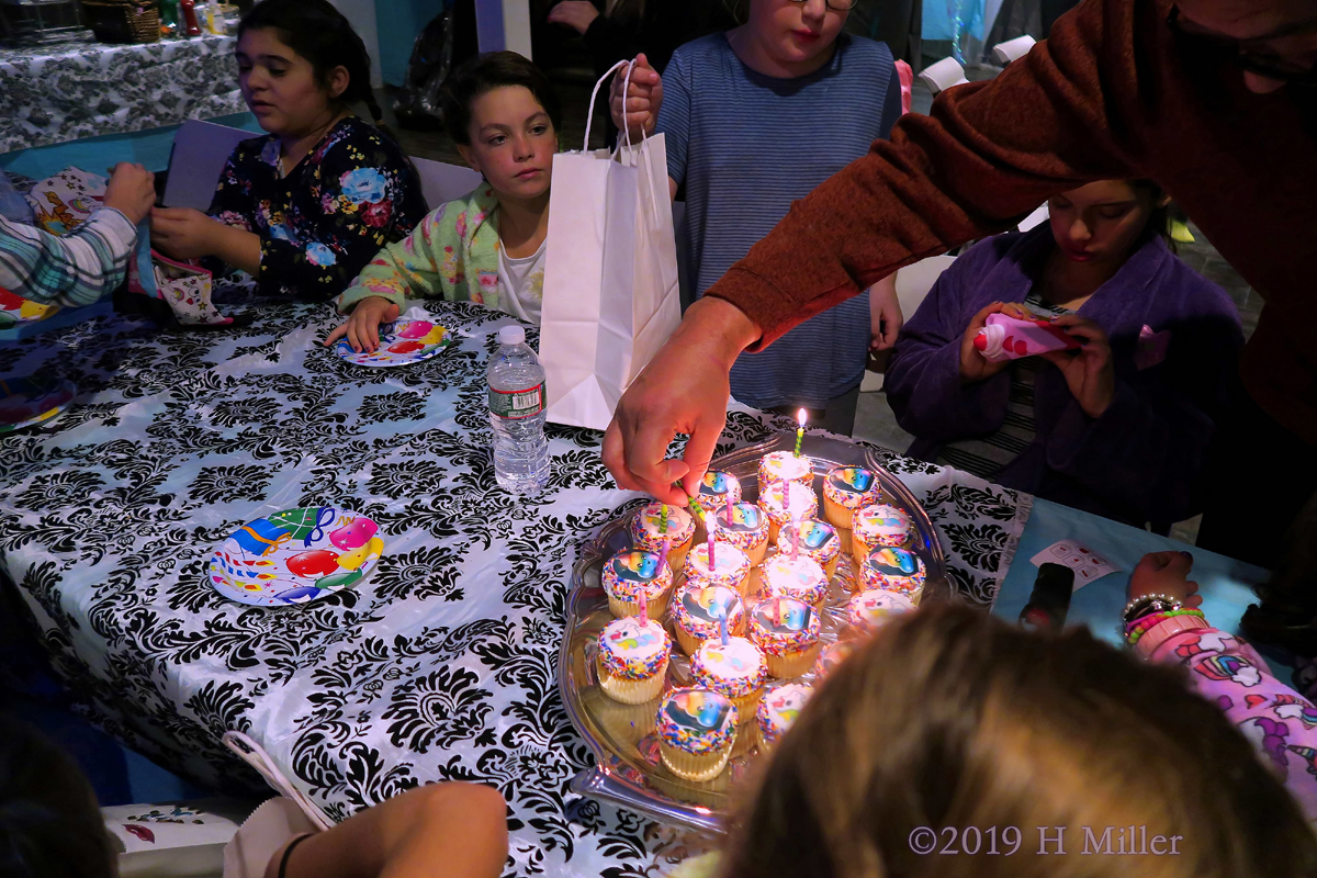 Seeing The Light! Cupcakes Get Candles At The Spa Birthday Party! 1