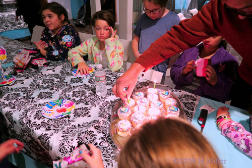 Checking Out The Candles! Spa Party Guests Gather Around The Table! Checking Out The Candles! Spa Party Guests Gather Around The Table!