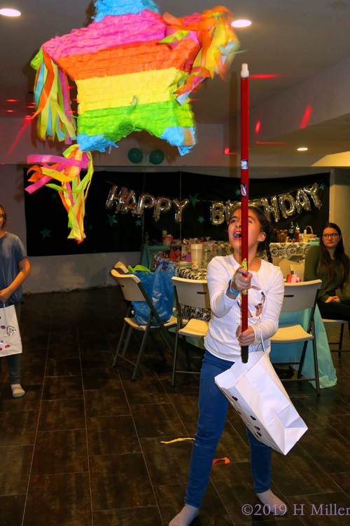 Securing The Bag! Ready For Candy! Kids Pinata Fun At The Spa Party! Securing The Bag! Ready For Candy! Kids Pinata Fun At The Spa Party!