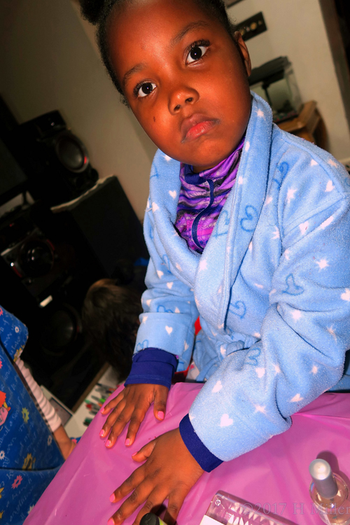 She Looks At The Camera While She Gets Her Mini Mani She Looks At The Camera While She Gets Her Mini Mani