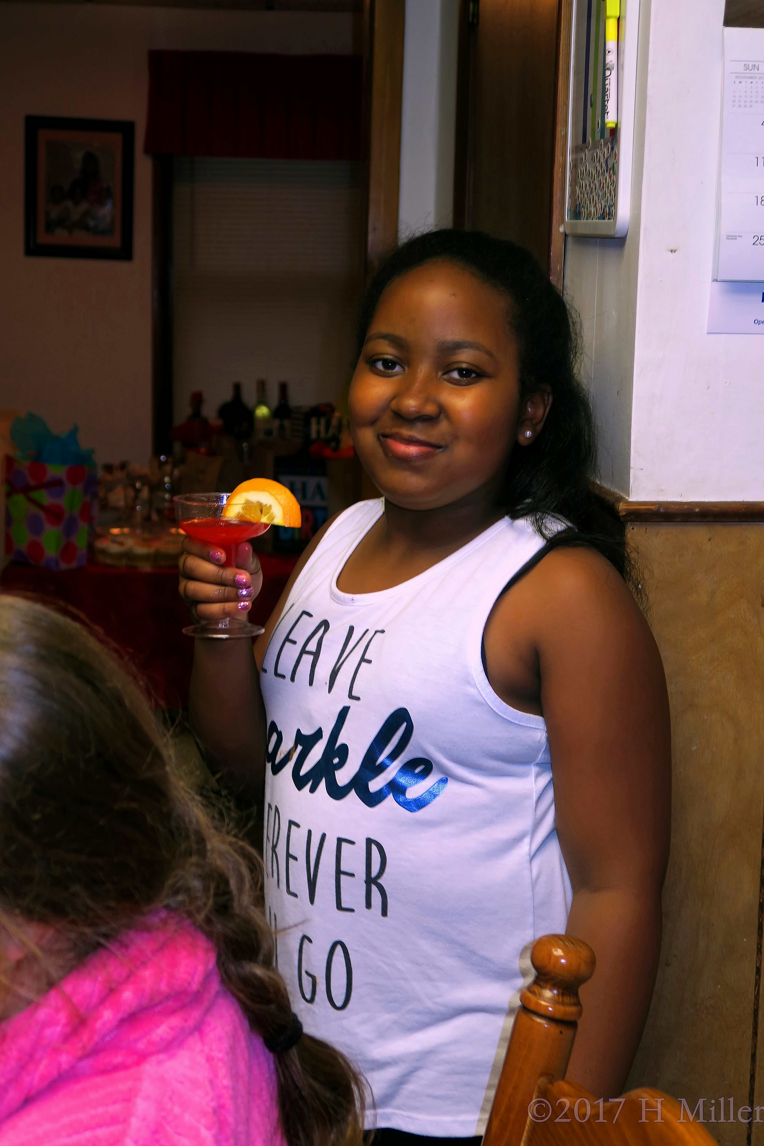 Birthday Girl Holds The Refreshment Cup For A Toast And Smiles. 