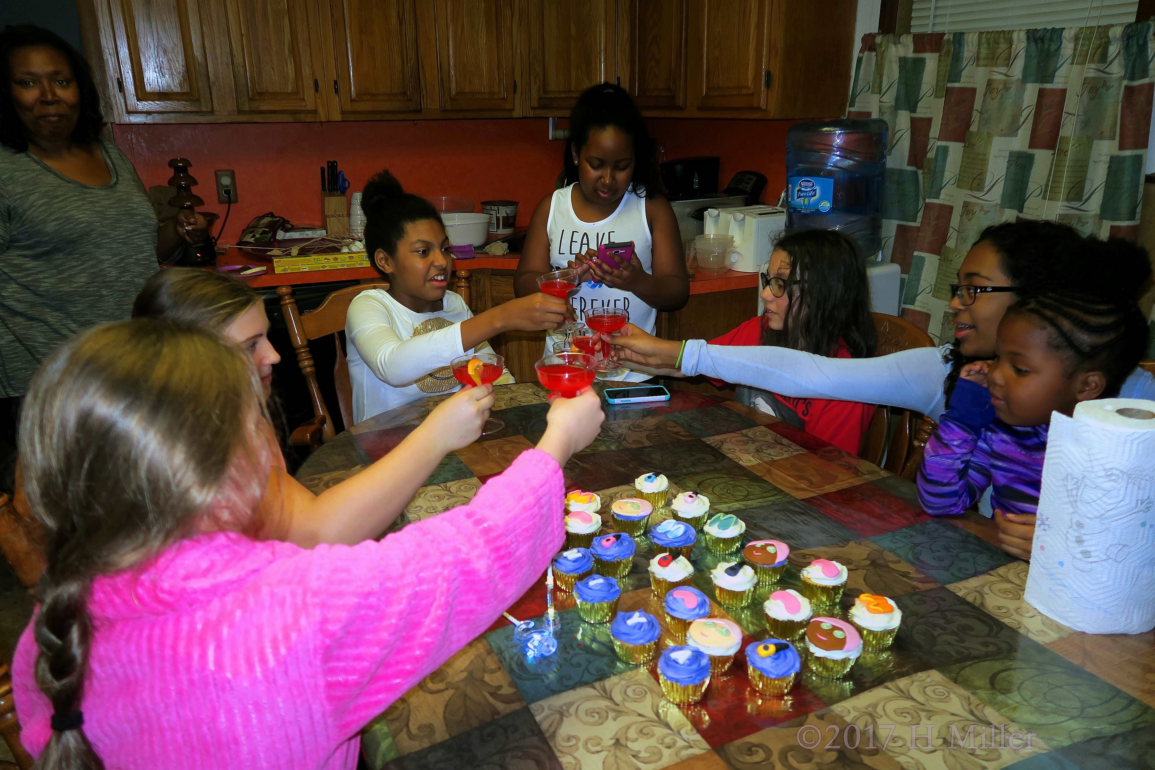 The Girls Are Celebrating Aniya's Birthday At The Dining Room Table With Another Toast! 