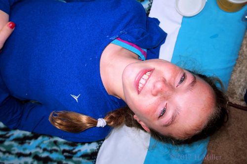 After Her Kids Facial Spa Treatment, Smiling And Enjoying The Spa Party After Her Kids Facial Spa Treatment, Smiling And Enjoying The Spa Party