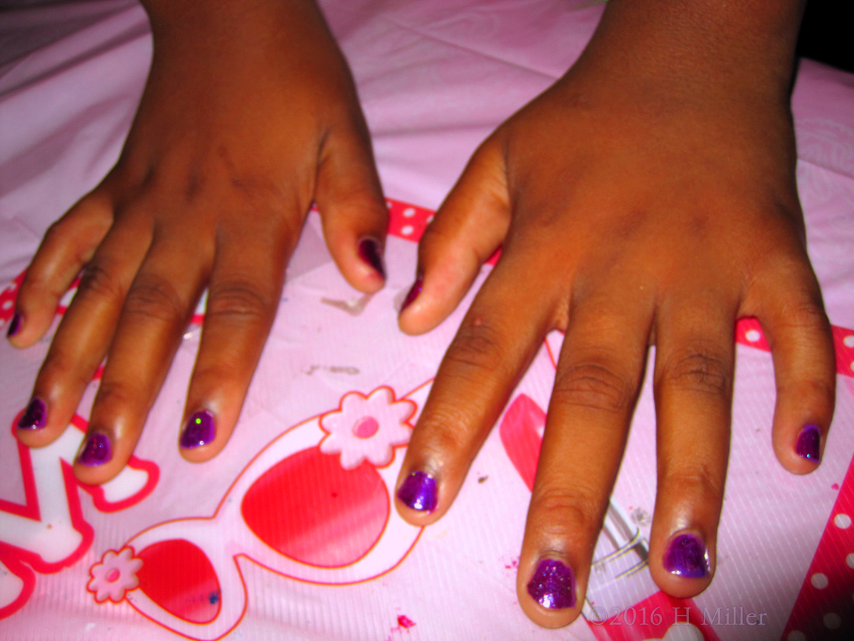 Purple Girls Manicure With Sparkles At The Spa Party 
