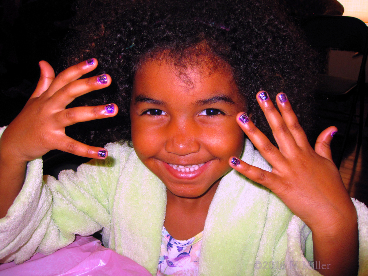 Purple Sparkle Manicure With A Happy Face On This Party Guest! 