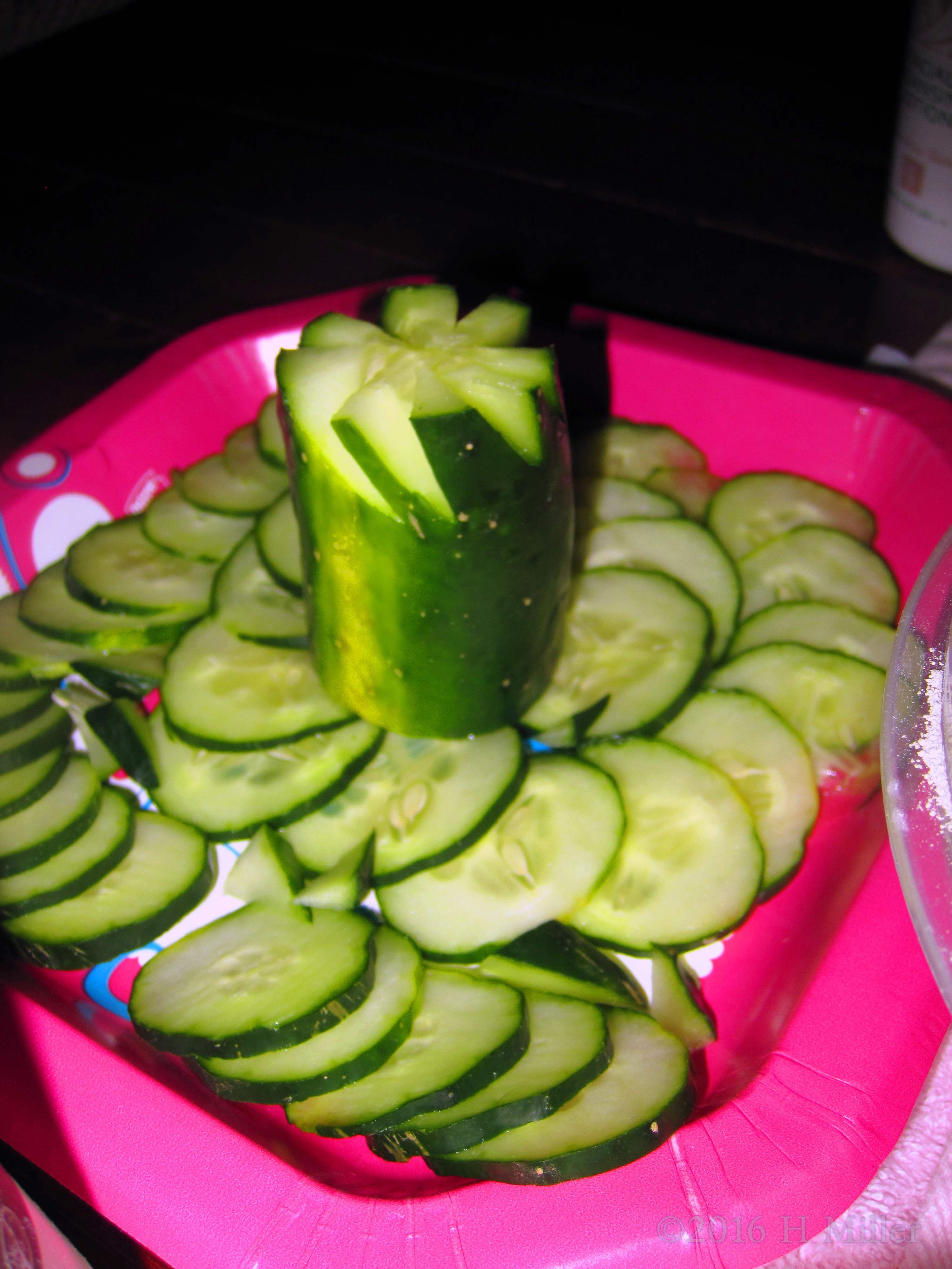 Cucumber Cuttings For Kids Facials On A Pink Plate Cucumber Cuttings For Kids Facials On A Pink Plate