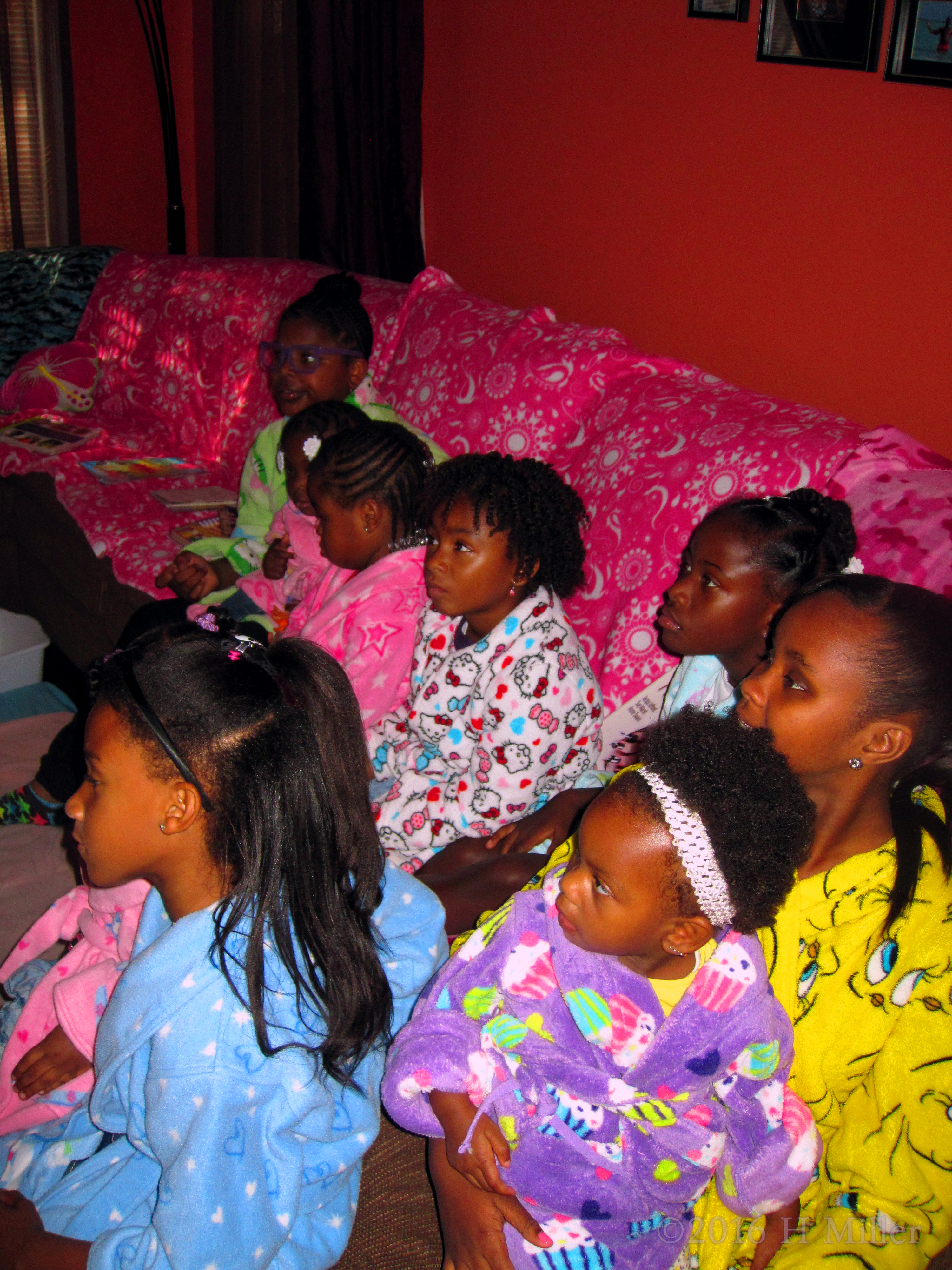 Everyone Dressed In Spa Robes On The Couch Listening... Everyone Dressed In Spa Robes On The Couch Listening...