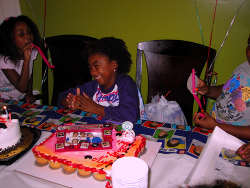 Birthday Girl Celebrates With Two Guests Birthday Girl Celebrates With Two Guests